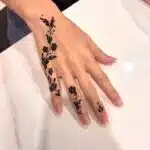 floral finger mehndi design
