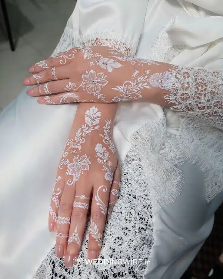 Pakistani mehndi designs with glitter highlights for bridal hands