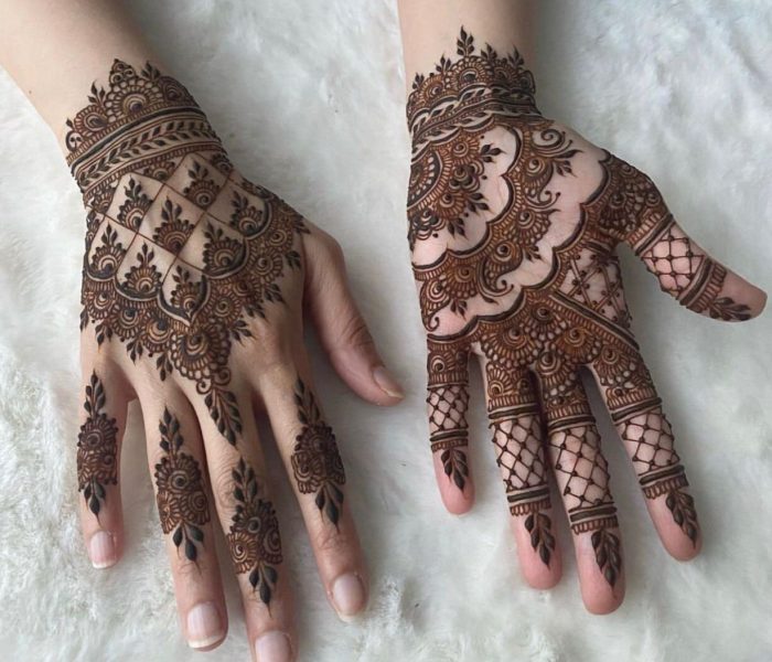 Pakistani mehndi design for bridal full hands with floral motifs